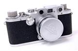Lot 57: 1949 Leica 111C DRP camera with Ernst Leitz Wetzlar Summitar f=5cm
1:2 lens with cap in very good condition est. $400.00-$600.00