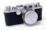 Lot 61: 1952 / 53 Leica 111F DRP camera with Ernst Leitz Wetzlar 
Summitar F=5cm 1:2 lens, near mint with lens cap, est. $400.00-$600.00