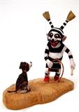 Lot 97: Neal David (Hopi) carving of clown with dog and hoop
measuring 8.75" x 8" x 3", excellent condition, Neal David's
kachinas sell for $1,500.00-$2,000.00 est. $500.00-$800.00