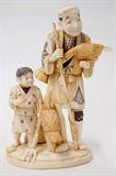 Lot 159: Chinese carved ivory figural group depicting a man
with 2 egrets and a boy with fish, measuring 7" tall x 4.25"
wide, having a stable age crack to the base, artist signed
c.1920-1940 est. $700.00-$1,200.00