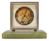 Lot 38: Art Deco, C. Bucherer 8 day bronze desk clock with
green marble base, depicting a harlequin kissing a woman's hand,
measuring approx. 4" tall x 4.5" wide at base, c. early 20th century,
est. $250.00 - $350.00