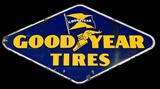 Lot 141: Porcelain Goodyear Tire sign measuring approx. 48" x 26"
weighing approx. 20 lbs. having some normal losses to both sides
of the porcelain from age and use c.1950 est. $300.00-$500.00