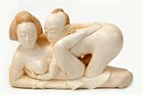 Lot 89: Japanese erotic ivory carving depicting an amorous
couple, measuring 4.75" x 3", having coloured scrimshaw,
artist signed, est. $900.00-$1,100.00