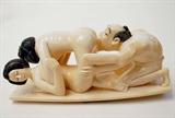 Lot 91: Japanese erotic ivory carving depicting an Oriental
"menange a trois", measuring 5.75" long x 2.625" tall
artist signed, est. $1,200.00-$1,500.00