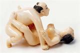 Lot 32: Japanese erotic ivory carving depicting an amorous
anatomically correct couple, measuring 3" long x 1.5" tall,
artist signed, est. $250.00-$350.00