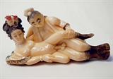 Lot 41: Japanese erotic ivory carving depicting an amorous
anatomically correct couple, having polychrome scrimshaw,
measuring 2.875" x 1.625" est. $250.00-$350.00