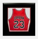 Lot 132: Autographed Michael Jordan jersey, nicely framed, the jersey
measuring approx. 22" wide, est. $1,500.00 - $2,000.00