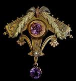 Lot 71: Very fine 14K tri-colour gold lavalier brooch set with
2 hand cut amethyst gemstones, measuring 1.7" x 1.7",
weighing 8.4 grams 14K, c.1860-1880 est. $350.00-$450.00