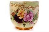 Lot 55: Large William Guerin Limoges porcelain jardinere planter
measuring 11" x 11.5" in excellent condition, elaborated with floral
transfers and applied enamels, c.1891-1932, est. $700.00-$900.00