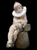 Lot 19: Lladro 5203 figurine measuring 8" tall, perfect
condition, est. $100.00-$120.00