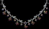 Lot 85: Lovely 14K diamond encrusted 17" necklace set with 62
faceted fancy colour sapphires, est. $1,500.00-$2,000.00