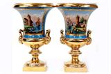 Lot 92: Pair of fabulous Sevres porcelain hand painted 12" x 7" urns
decorated with different scenes on both sides, overall fine condition
having some slight rub losses to the gold highlighting from age and
use, no chips, cracks or repairs, two very fine examples,
est. $400.00-$800.00