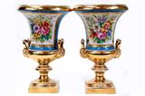 Lot 92: Pair of fabulous Sevres porcelain hand painted 12" x 7" urns
decorated with different scenes on both sides, overall fine condition
having some slight rub losses to the gold highlighting from age and
use, no chips, cracks or repairs, two very fine examples,
est. $400.00-$800.00