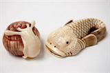 Lot 102: Japanese carved ivory netsuke pair measuring 1"
and 0.5" x 2", artist signed, est. $250.00-$300.00