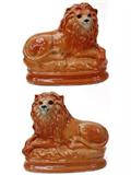 Lot 36: Pair of Staffordshire lions with glass eyes measuring 11" long
x 10" tall, overall fine condition, one having a small loss to the back
see photo) est. $300.00-$400.00