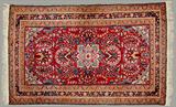 Lot 169: Vintage Persian hand woven Tabriz, deep wine colour
measuring 42" x 62" c.1940, est. $200.00-$400.00