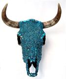 Lot 150: Southwestern steer skull encrusted with 4 lbs. of
turquoise, est. $250.00-$350.00