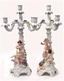 Lot 112: Pair of German Von Schierholtz 21.5" porcelain 5 light candelabras
decorated with Putti and applied floral and leaf design, accented in 24K
both in excellent condition, several minor normal losses to flower edges,
artist signed, est. $1,200.0-$1,500.00