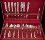 Lot 76: Sterling Watson Windsor Rose pattern service for 8 to include
8 dinner knives, 8 dinner forks, 8 salad forks, 10 teaspoons, 8 table spoons,
8 cocktail forks, 8 butter knives, 8 demitasse spoons, 1 master butter,
1 berry spoon, 1 cold meat fork and 1 serving spoon, no monograms,
est. $1,800.00-$2,000.00