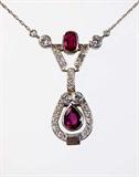 Lot 87: Antique 14K ruby diamond 18" necklace featuring 2 rubies
accented with 23 diamonds, 3 carats TCW weighing 5.5 grams,
est. $1,000.00-$1,500.00