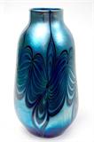 Lot 49: Orient & Flume 9.5" blue iridescent pulled pattern Art Glass
vase c.1976, excellent condition, est. $200.00-$300.00