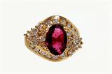 Lot 69: Estate 14K ruby diamond ring set with a 2.50 carat oval cut ruby
accented with 32 round diamonds approx. 1 carat TDW , weighing 8
grams, size 7 1/4 est. $1,500.00-$1,800.00