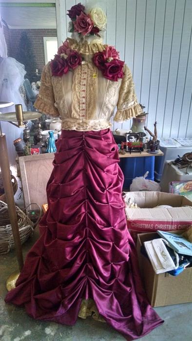 Gorgeous vintage clothing displayed on a dress form