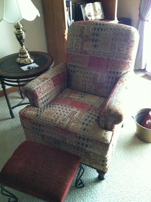 Stunning upholstered chair and small footstool
