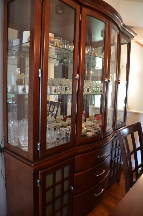 Gorgeous lighted china cabinet to match the table and 6 chairs.