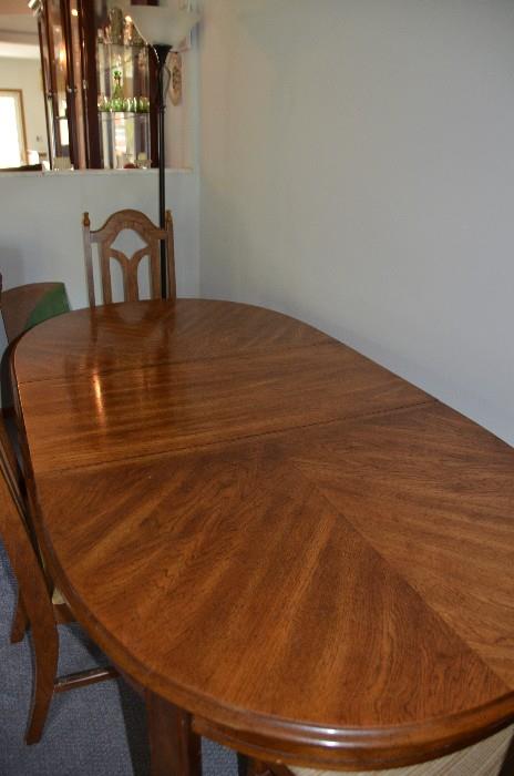 The 2nd dining set thats comes with 6 chairs, a large leaf and table pads. The table top is pristine.