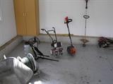 Tiller, sprayer, weed whacker, edger, blower/vac, hoses, other garage stuff