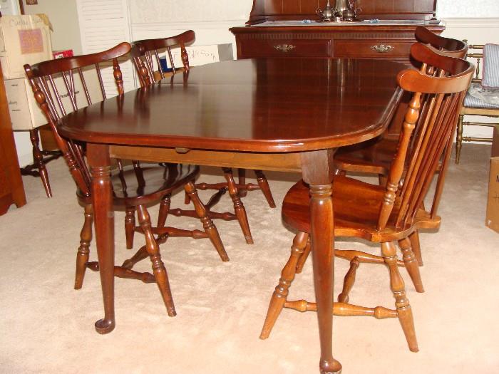 Dining Table with leaves and pads plus 6 matching Windsor style chairs