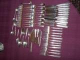 Gorham "Camellia" Sterling Silver 63 pieces - 12 forks, 12 salad forks, 12 spoons, 12 knives,1 pie server, 4 butter knives, 4 soup spoons, 3 serving spoons, 1 serving fork, 1 soup ladle, 1fruit spoon