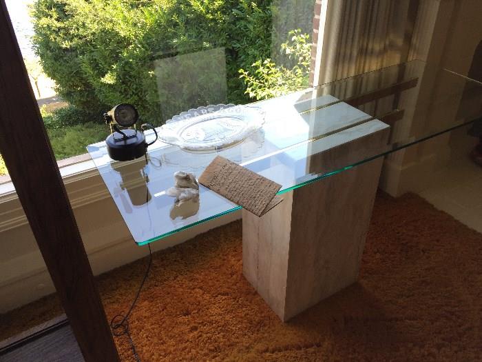 Unique glass topped, marble base table 