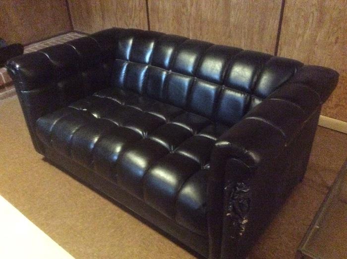 Black vinyl sofa