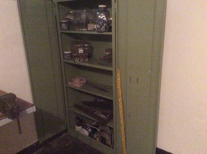 Green metal cabinet, tools