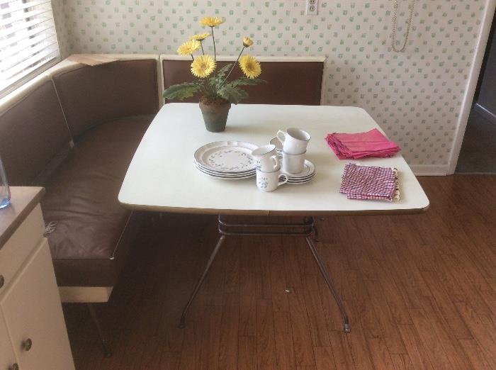Kitchen banquette seating and retro table 