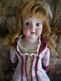 Armand Marseille open-mouthed porcelain doll.  Kid body. Porcelain hands and legs. $150