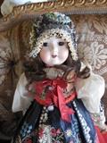 A.M Porcelain doll in Peasant dress $175