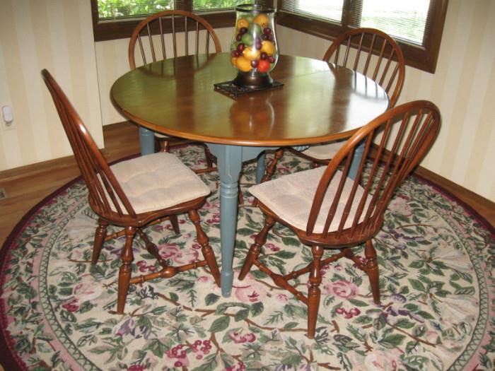 Temple Stuart kitchen table and 4 chairs 46 inches round . With leaf add 16 inches- $200.00