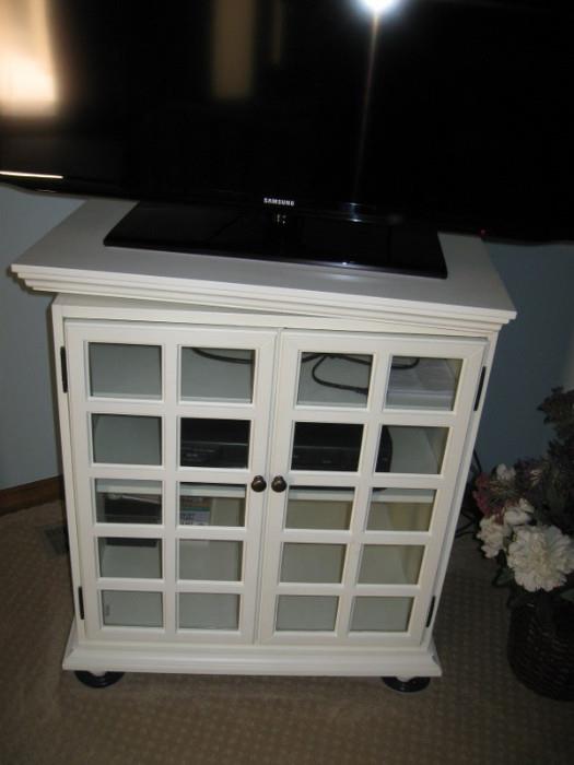 White swivel tv stand,20 deep, 28 wide, 32 tall-$50.00
