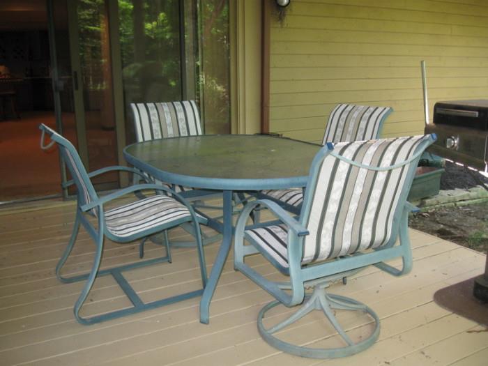 Outdoor patio set, and chairs, 5 ft long, 42 1/2 wide, -$150.00 have matching glider, lounge chair, chair and ottoman
