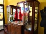 Large cabinet with lovely beveled glass.  Elegant and useful in almost any room in the house.  