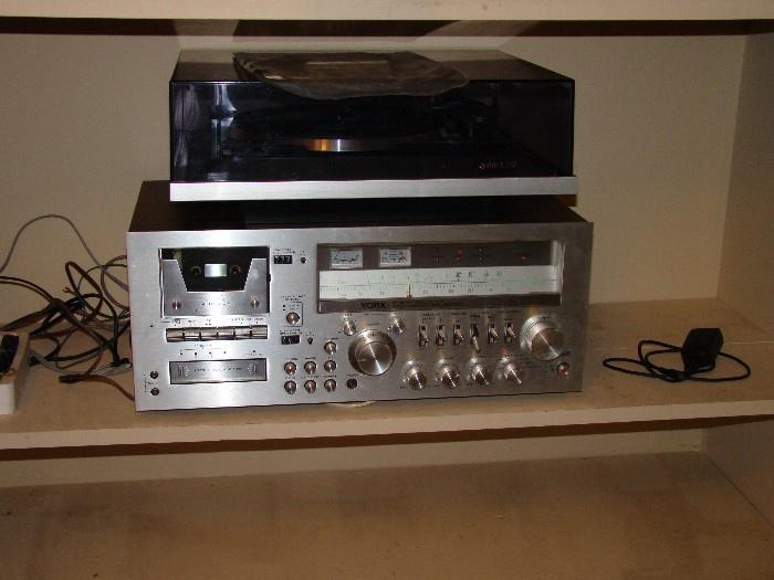 Yorx stero and turntable - works very well.  It is in a closed cabinet so if you are interested be sure to ask about it when you come to the sale