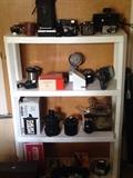 Many vintage cameras and lenses