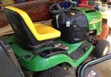 John Deere riding mower with bagger