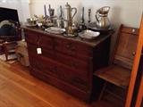 Pewter coffee set and large selection distinctive pieces atop walnut 4 drawer low chest with marble top