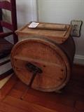 Large round wooden churn with stamped identification