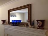 Array of vintage items and mantle top mirror