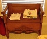 Small oak carved bench with storage